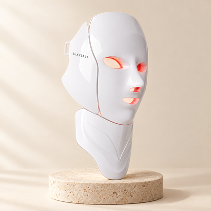 SILKYSALT LED face and neck mask on a pedestal
